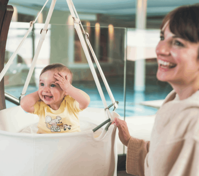 Mom and baby in a family hotel in Italy